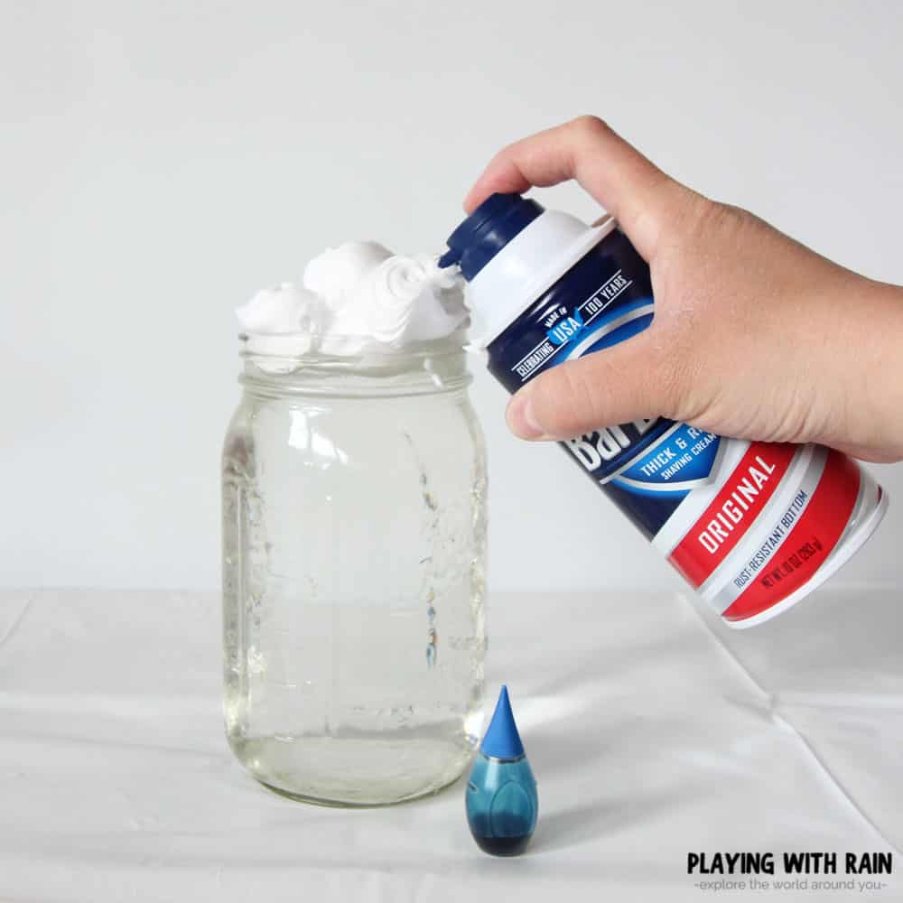 spraying shaving cream onto water