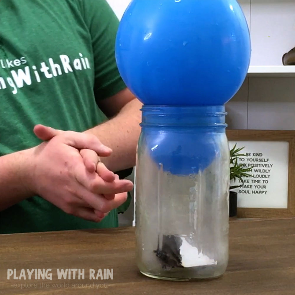 Balloon being sucked into a jar