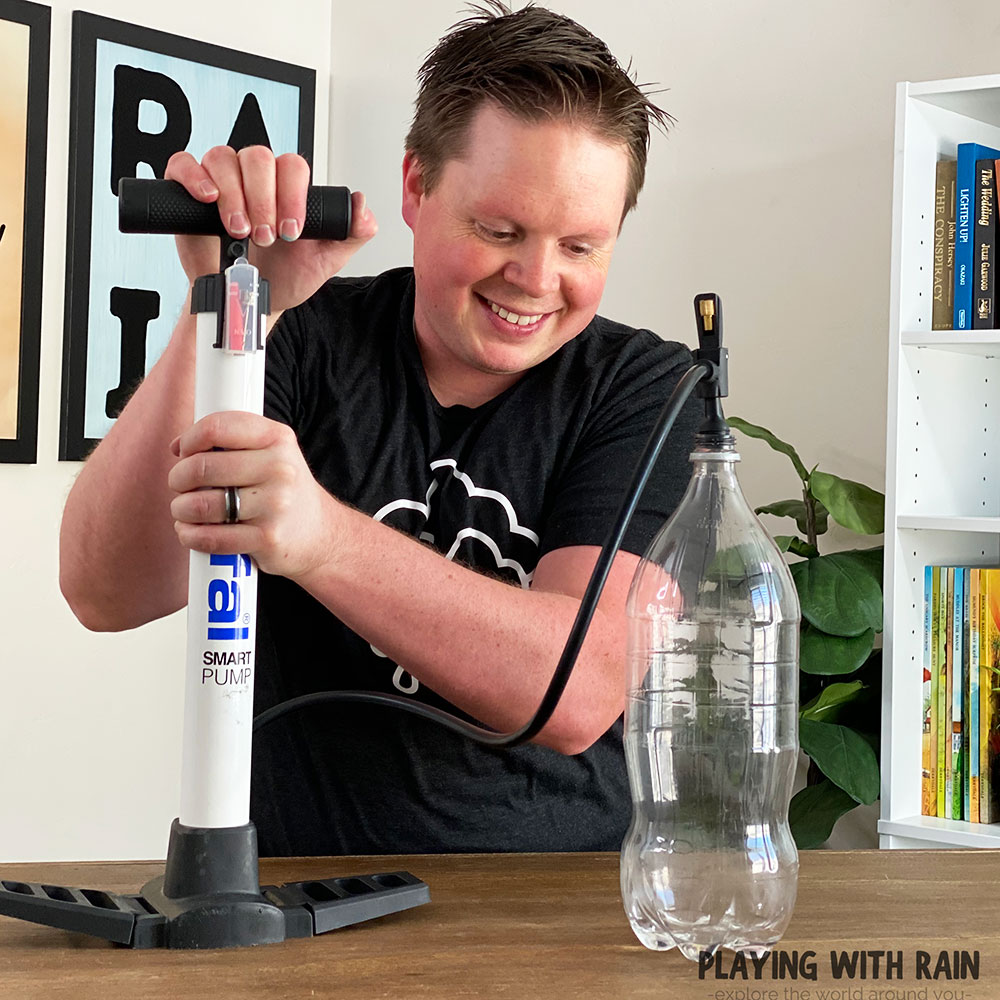 Pump air into the bottle with a pump