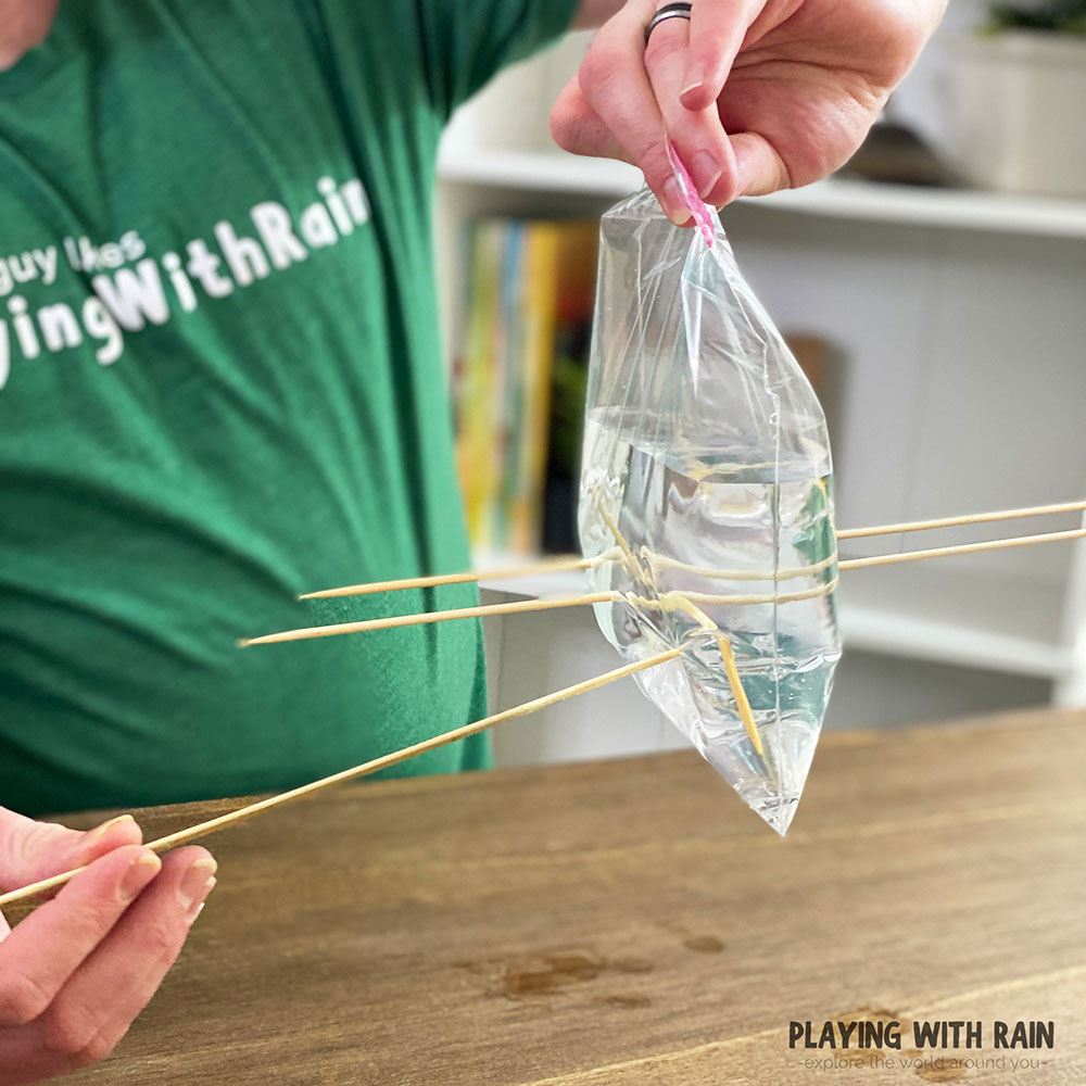 Push skewers all the way through the bag