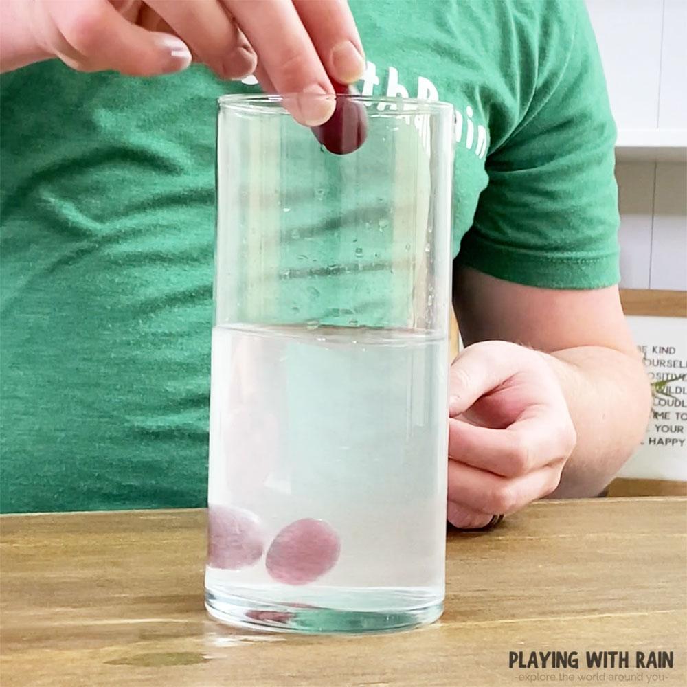 Drop a handful of grapes into the water
