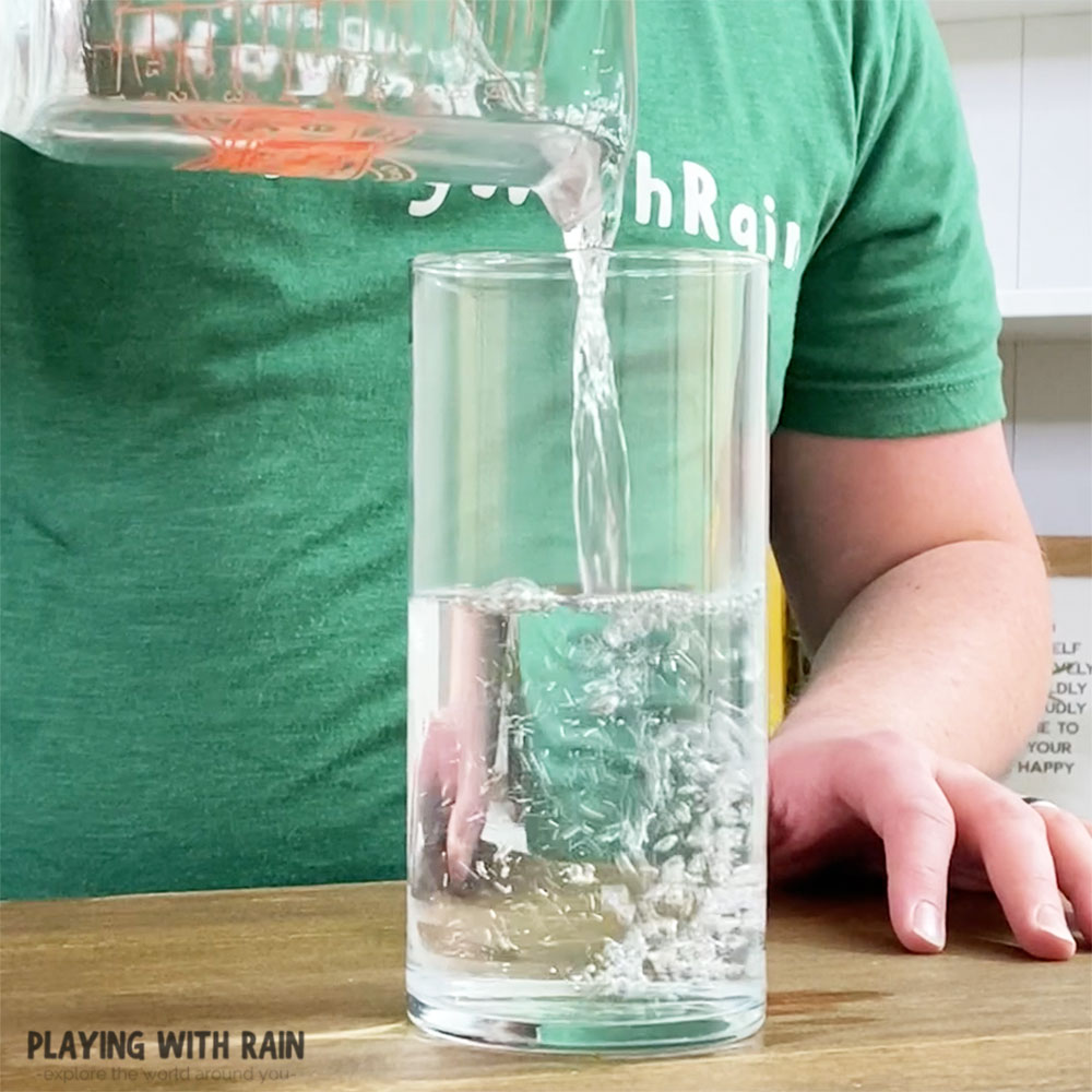 Fill a glass about halfway with water