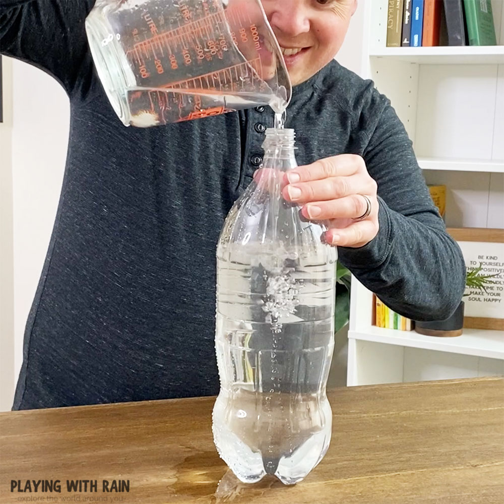 Pour water into a plastic bottle