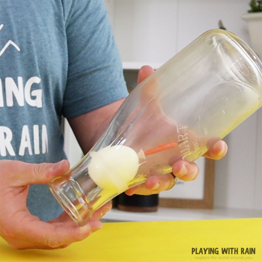 Egg in an upside-down bottle trick