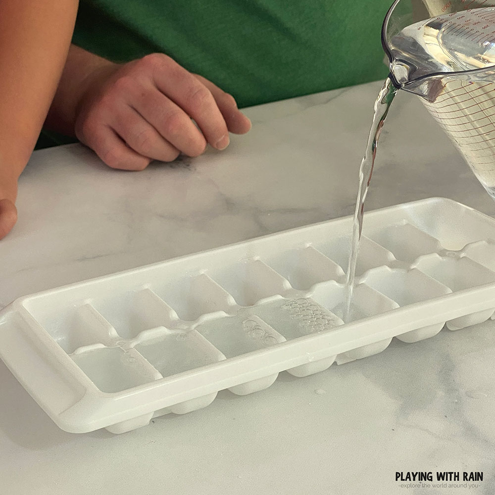 Pour water into an ice making tray